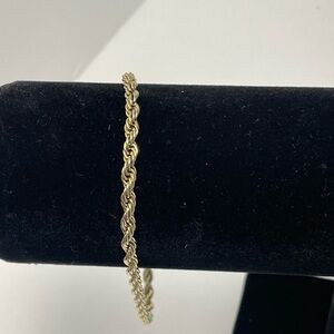 Gold tone rope bracelet